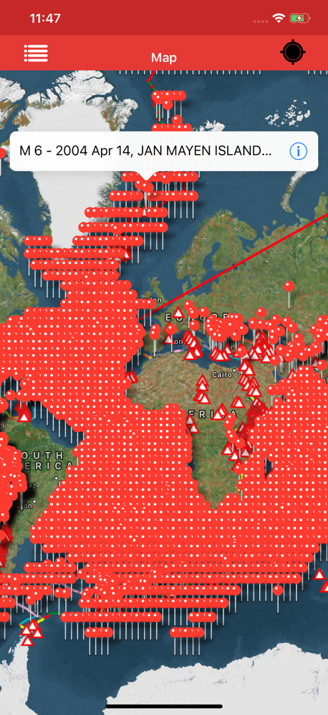 A map display in the Kmz Viewer app filled with numerous red markers and a data info bubble for Jan Mayen Island.