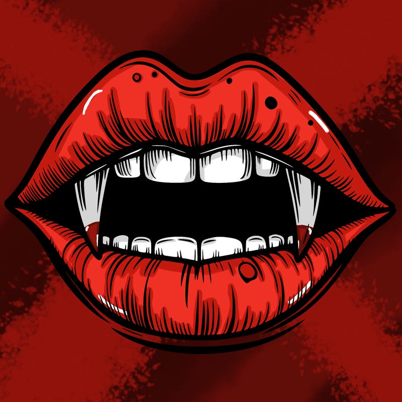 lips with vampire teeth