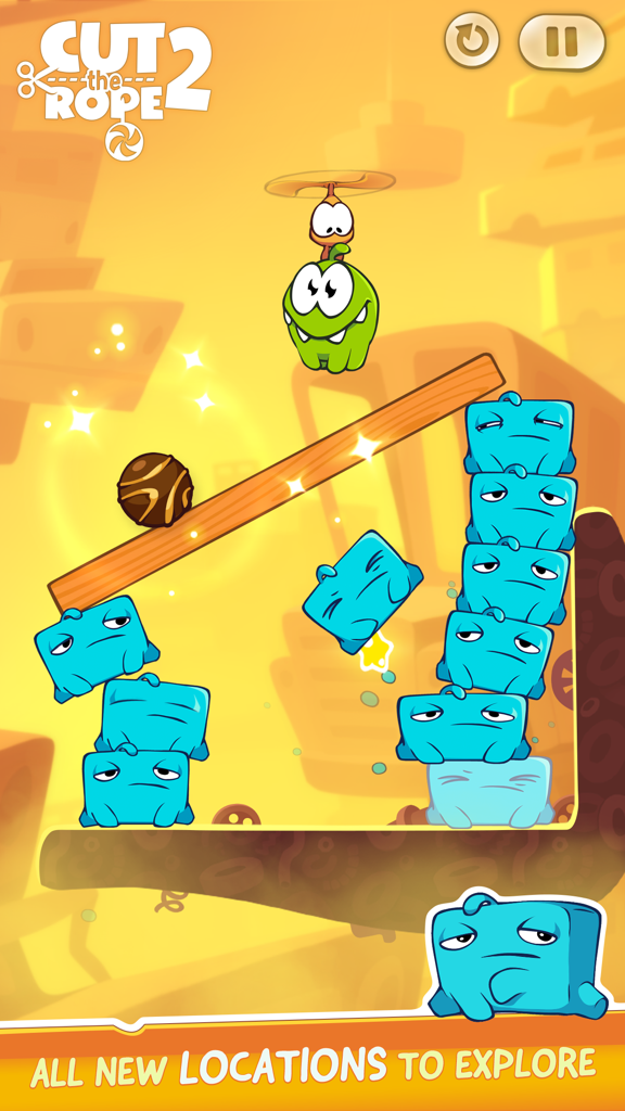 Cut the Rope 2 - Om Nom volando con Roto sobre un nivel de puzle basado en física en Cut the Rope 2