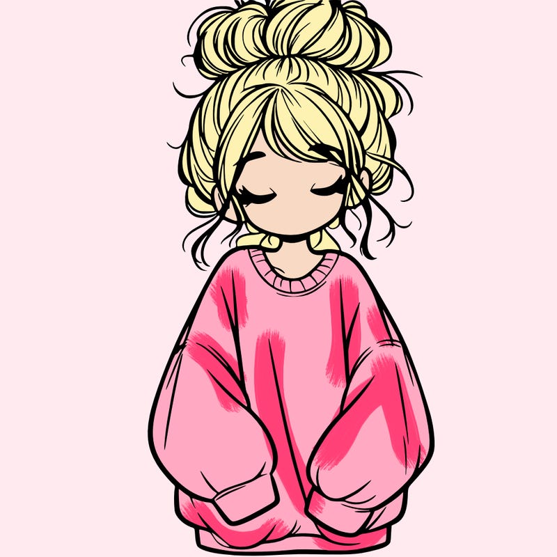 girl with baggy sweatshirt and messy bun