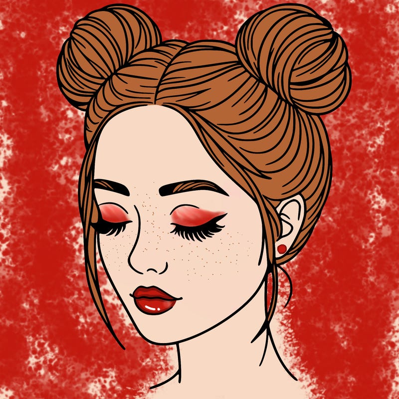 woman with hair buns