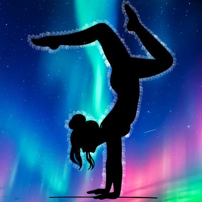 a woman doing a handstand