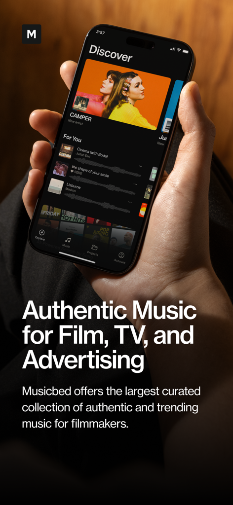 Musicbed app Discover screen on an iPhone featuring authentic music for film and advertising