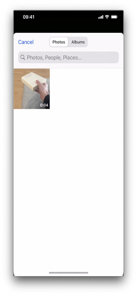 Photo and video library selection screen within the Reverse Video Editor app on an iPhone