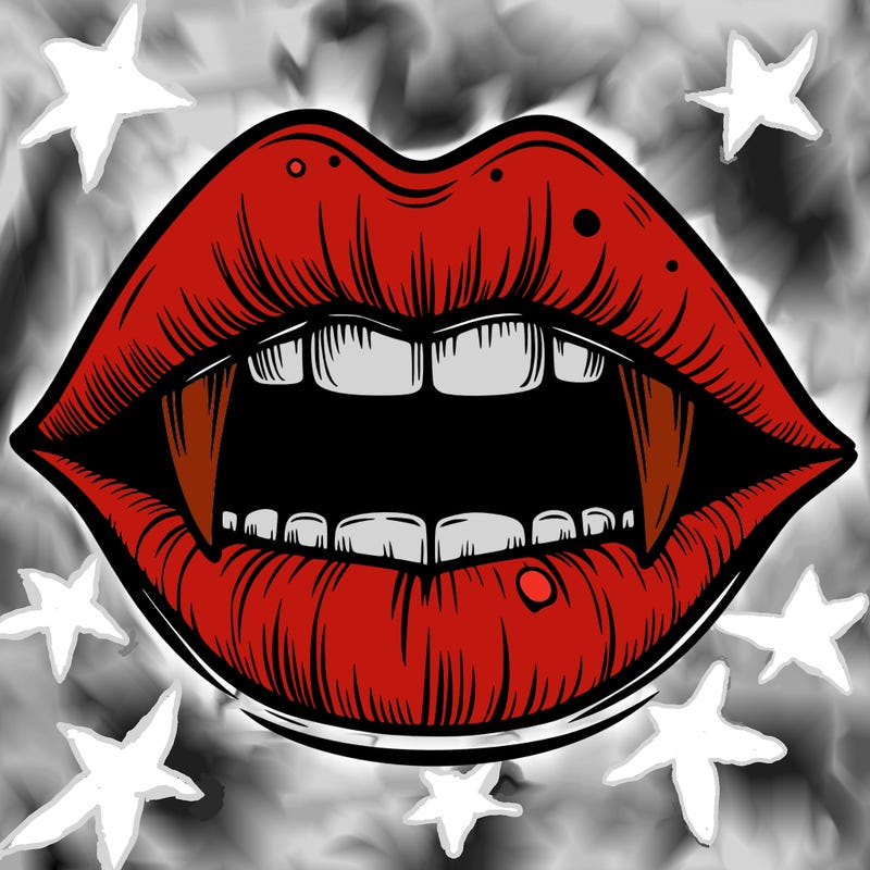 lips with vampire teeth