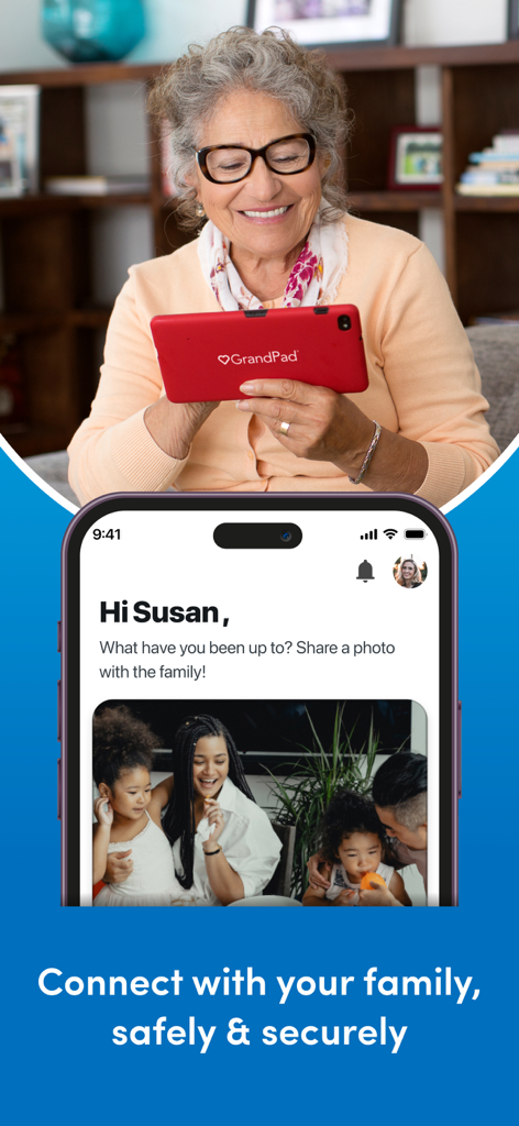 A smiling senior woman using a GrandPad tablet with a smartphone displaying the companion app for family photo sharing