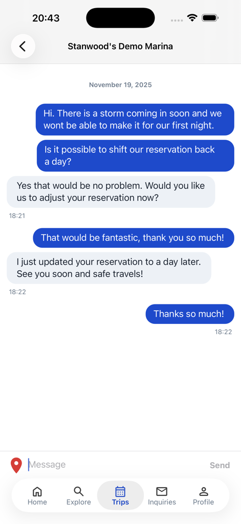 In-app messaging interface in Dockwa showing a conversation between a boater and a marina to adjust a reservation.