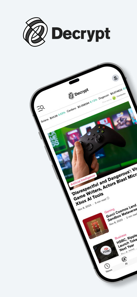 Decrypt: Bitcoin & crypto news - A smartphone displaying the Decrypt app home screen with news articles on AI and gaming alongside live cryptocurrency prices