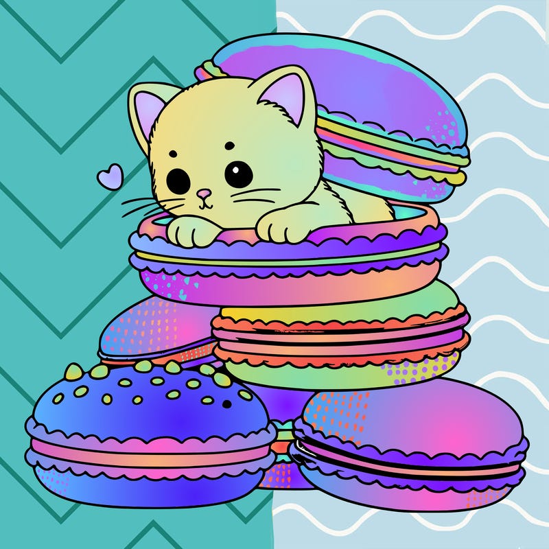 a kitten popping out of a stack of pastel macarons