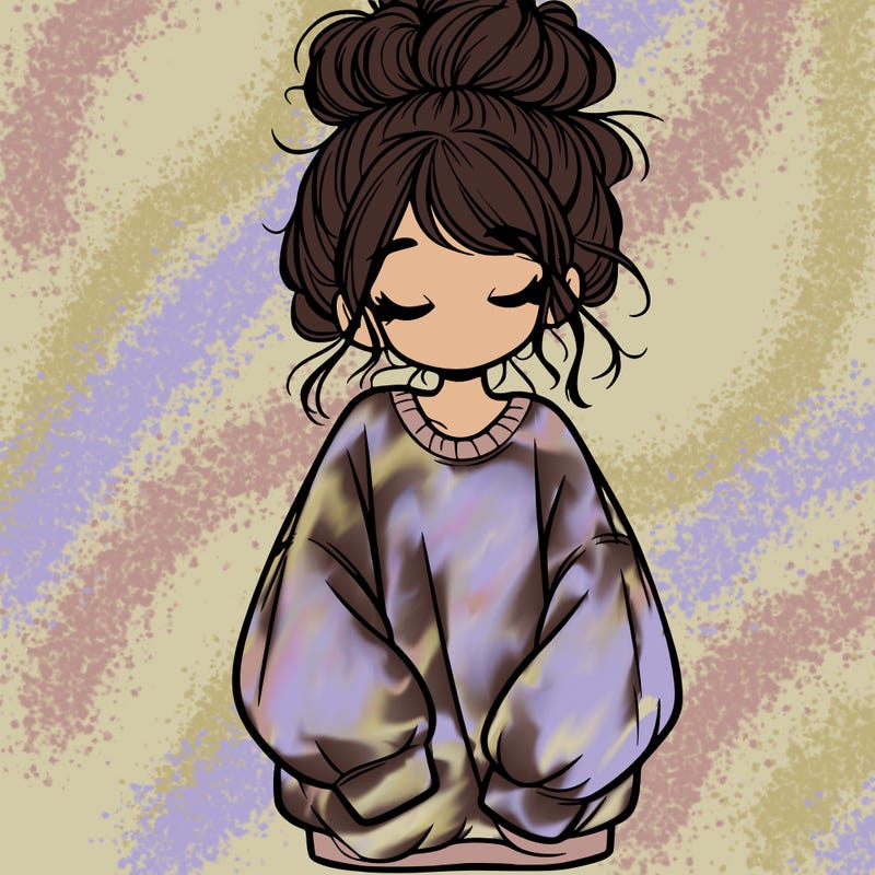 girl with baggy sweatshirt and messy bun