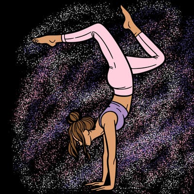 a woman doing a handstand