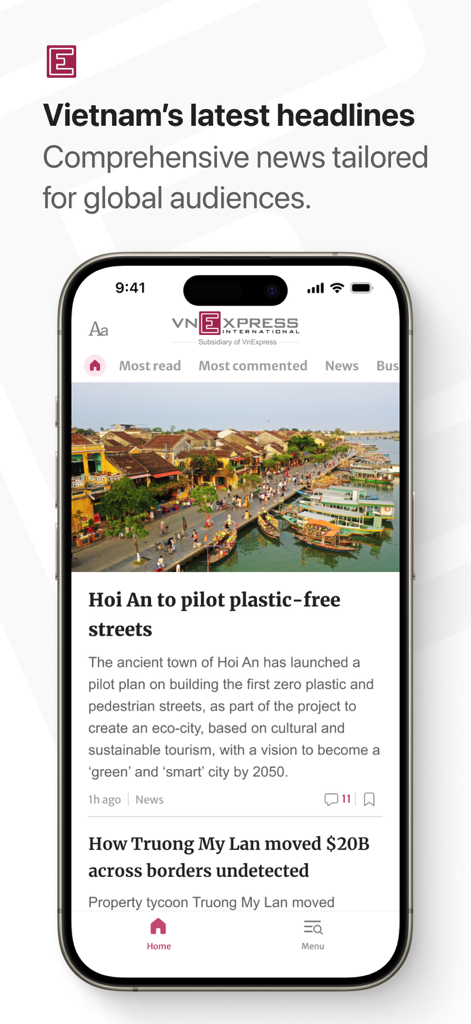Smartphone displaying the VnExpress International news app with headlines about Vietnam.