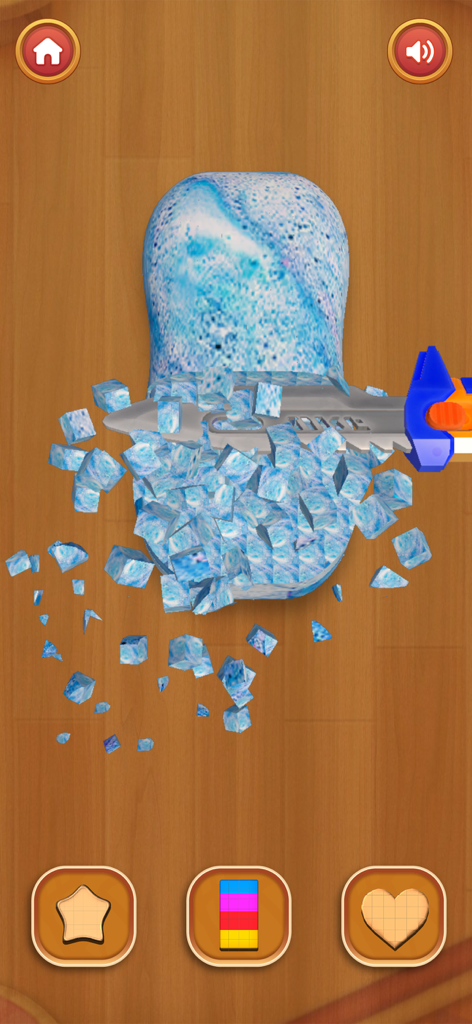 Mini Relaxing Game: Antistress - ASMR slicing activity in Mini Relaxing Game Antistress showing a blue object being cut into small cubes