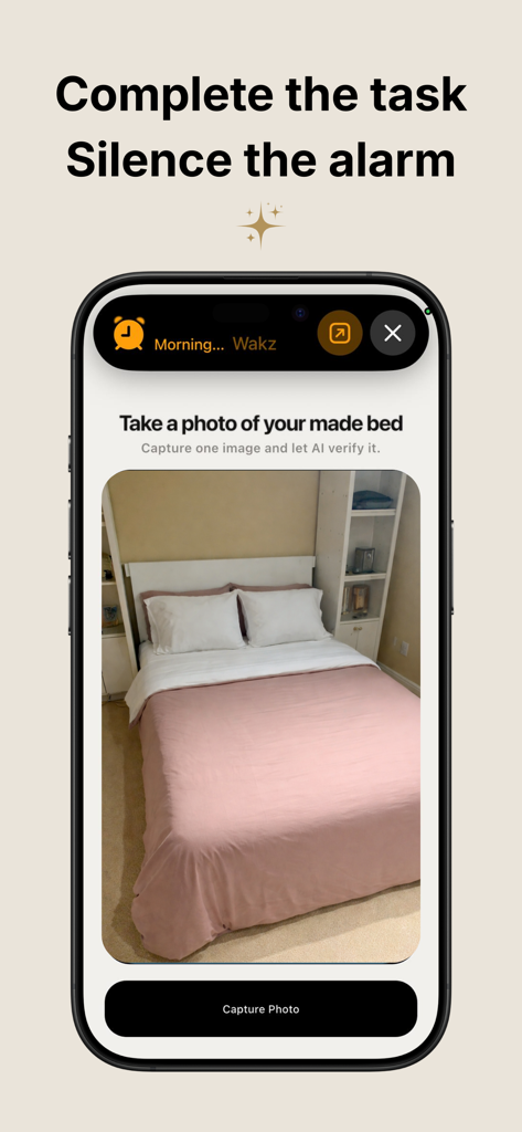 Wakz app interface showing a mission to take a photo of a made bed to silence the alarm