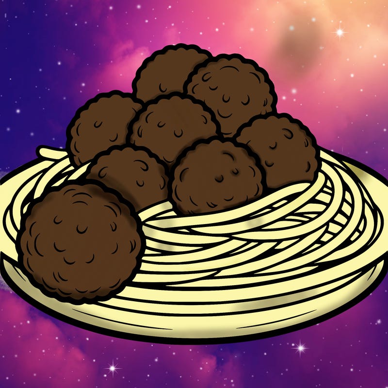 a plate of spaghetti with meatballs.