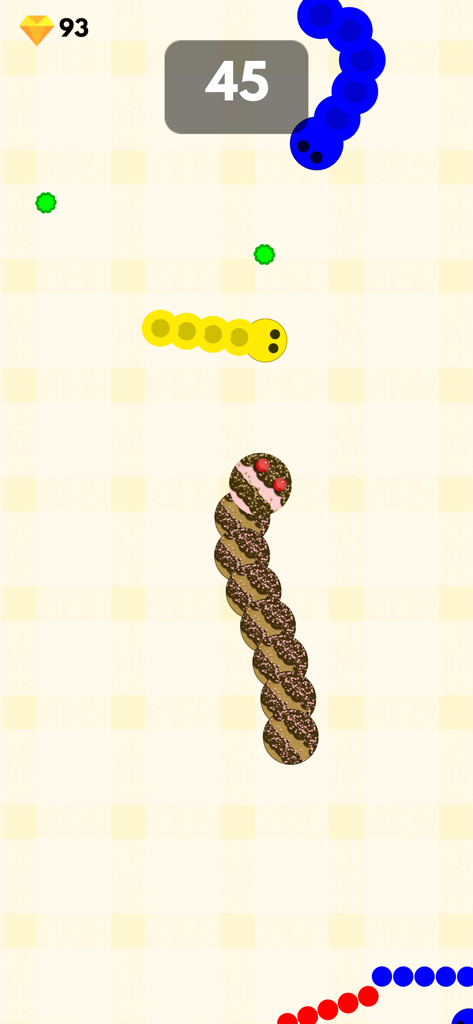 Gameplay of Eat Snakes Crazy Worm Arena with colorful snakes and gems.