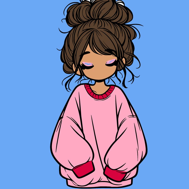 girl with baggy sweatshirt and messy bun