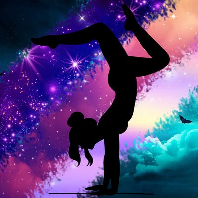 a woman doing a handstand