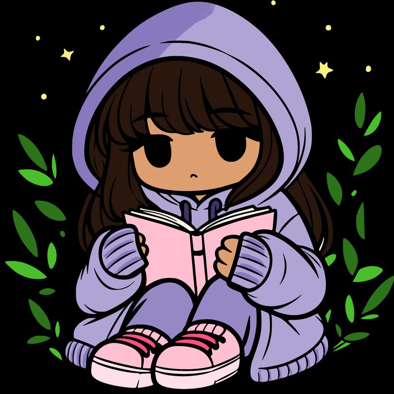 girl in oversized hoodie reading a book