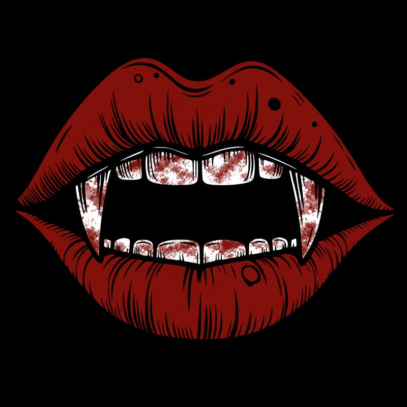 lips with vampire teeth