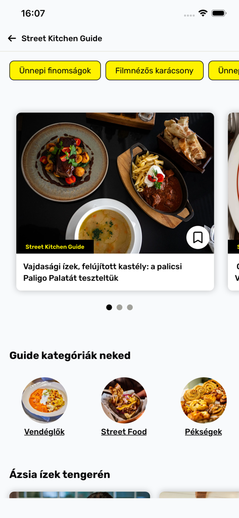 The Street Kitchen app guide interface showing restaurant categories like street food and bakeries with featured culinary articles.