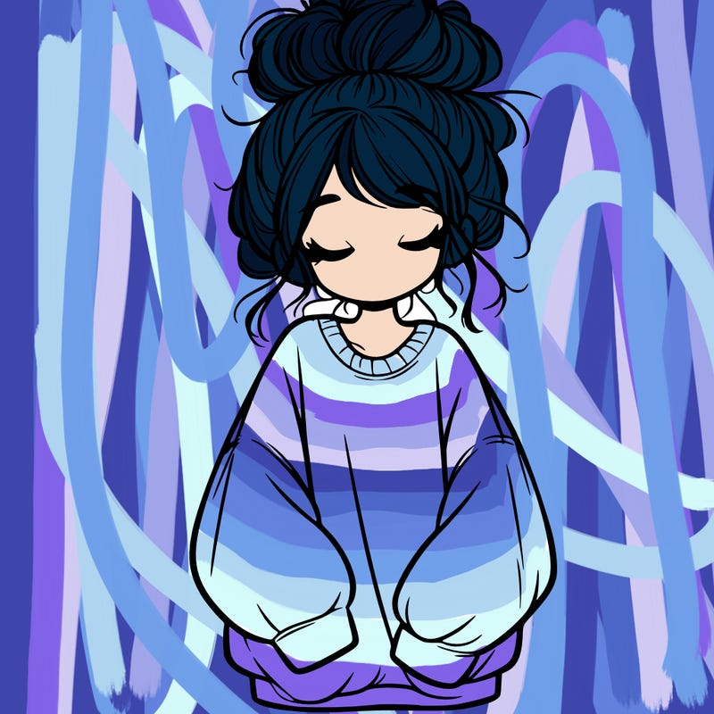 girl with baggy sweatshirt and messy bun