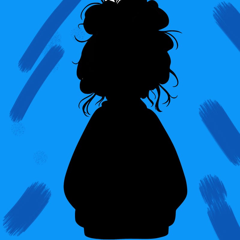 girl with baggy sweatshirt and messy bun