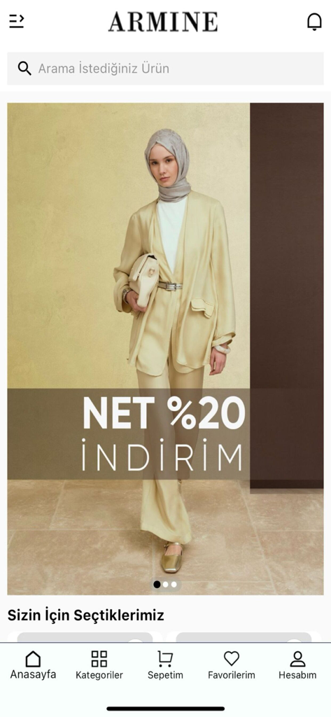 Schermata principale dell'app di moda modesta Armine che mostra un banner di moda modesta con un'offerta di sconto del 20%.