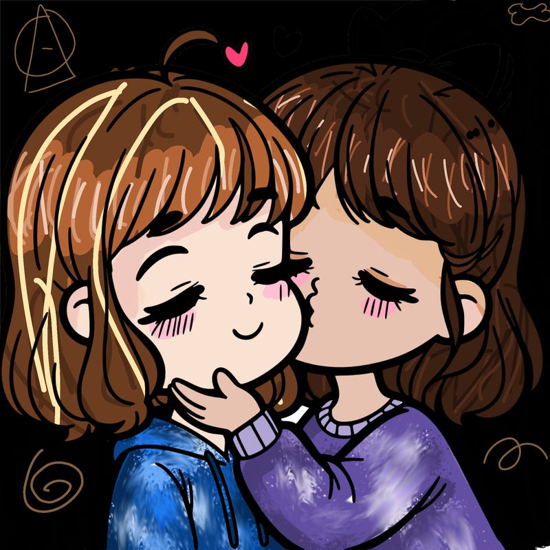 girl kissing a girl’s cheek