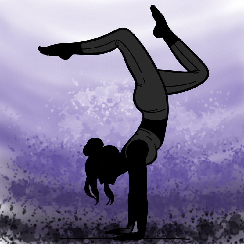 a woman doing a handstand