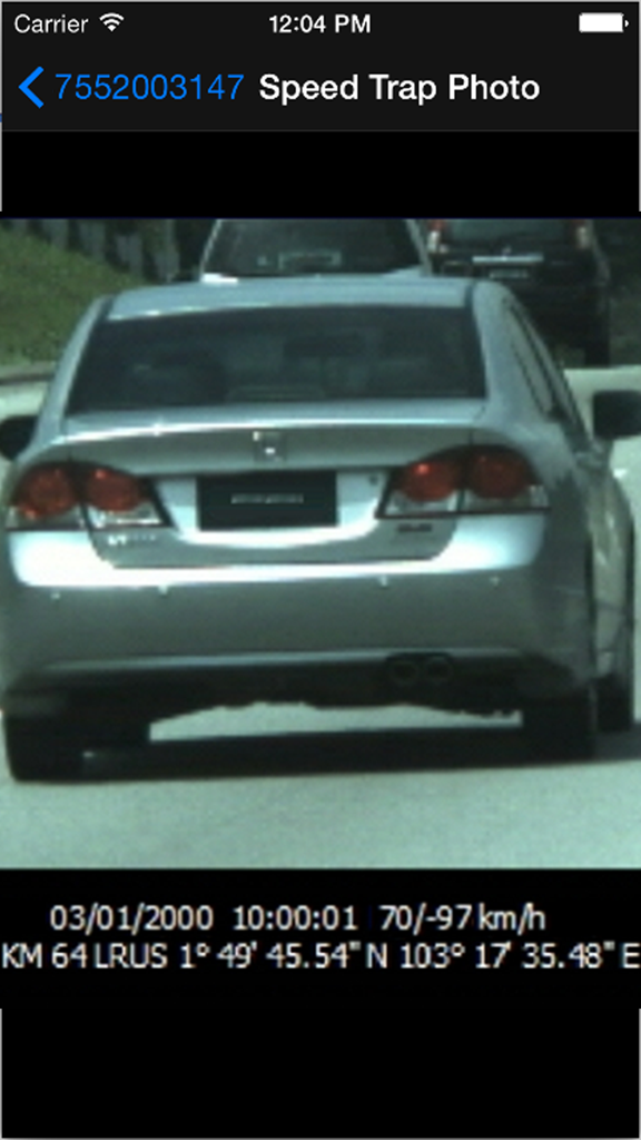Malaysia Police Summons - A speed trap photo within the Malaysia Police Summons app showing a vehicle with violation details and GPS coordinates.