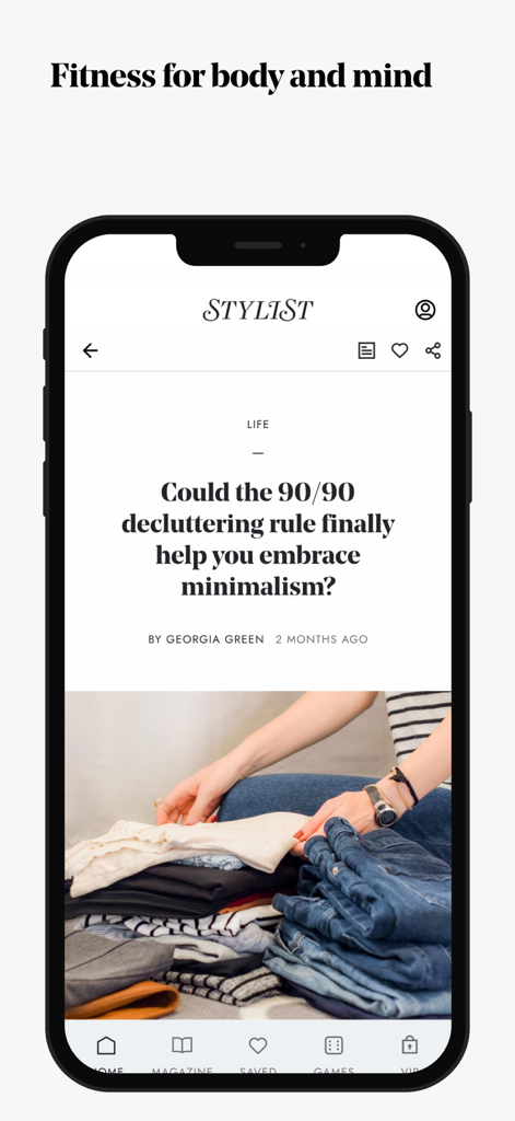 Smartphone displaying a lifestyle article about minimalism on the Stylist app