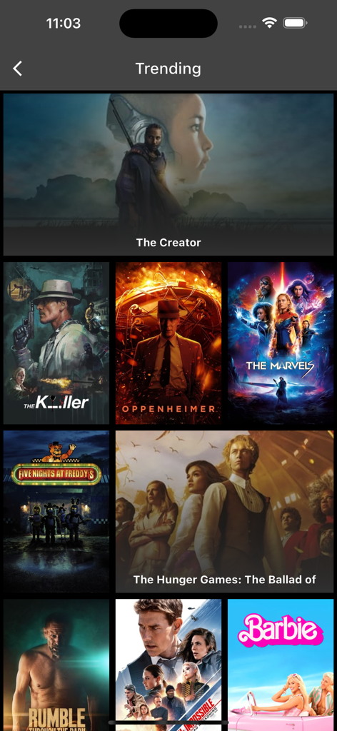Trending movies section in the myFilms app showing a collection of popular movie posters