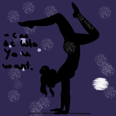 a woman doing a handstand