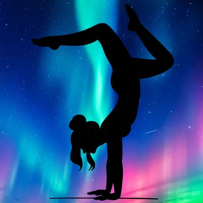 a woman doing a handstand