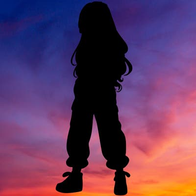 girl in baggy pants crop top and long hair