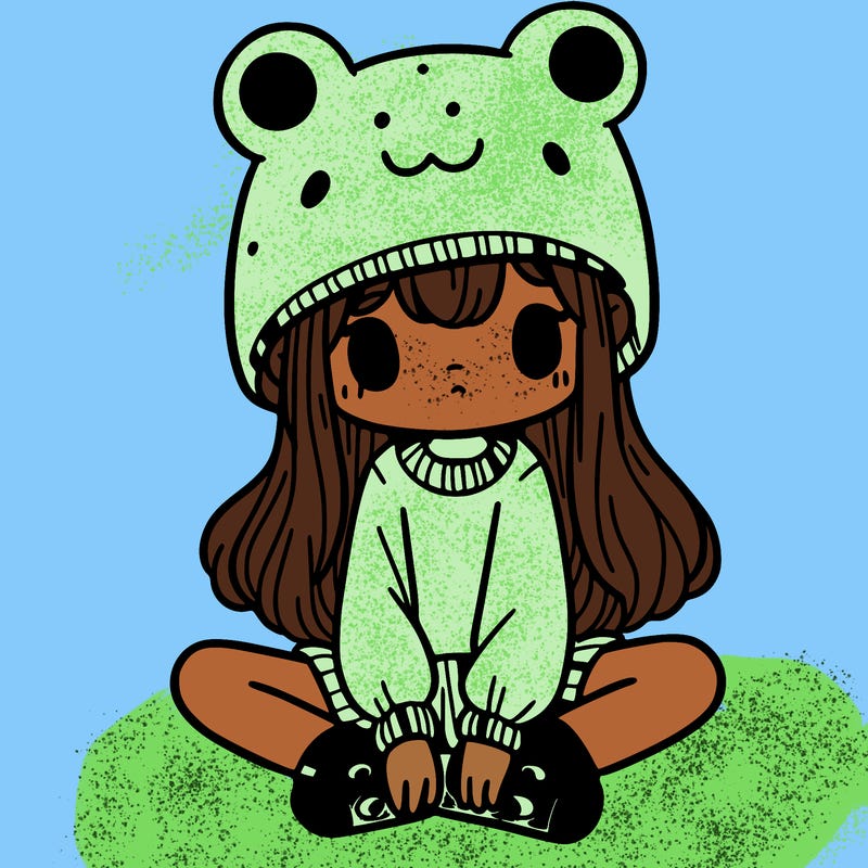 a girl wearing a frog hat and some frog socks