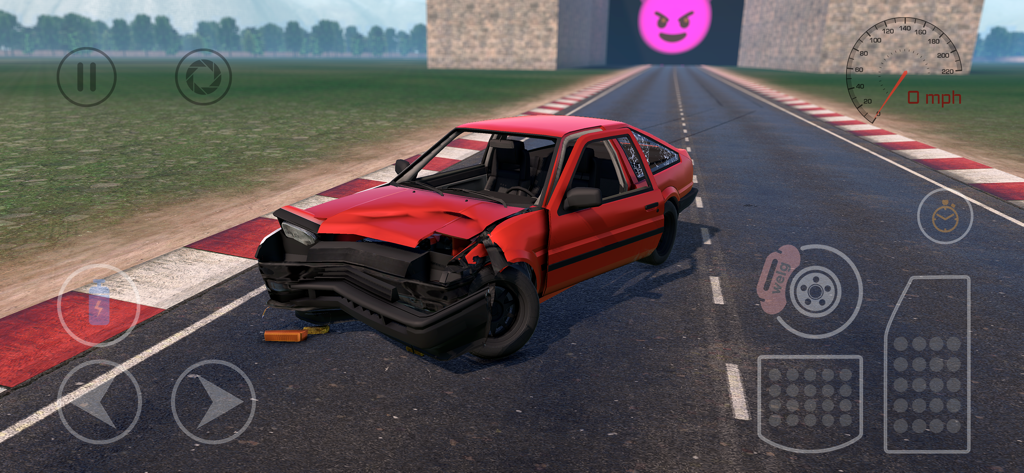 A red car with a wrecked front end on a racetrack in the WDAMAGE car crash simulator.