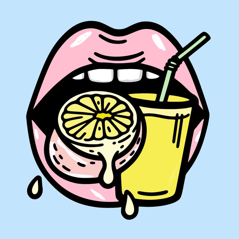 mouth with a lime in its mouth with a little bit of juice dripping