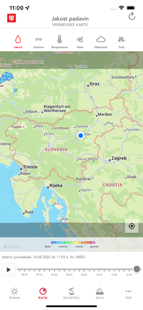 A weather map of Slovenia from the Triglav Vreme app showing precipitation intensity across the region.