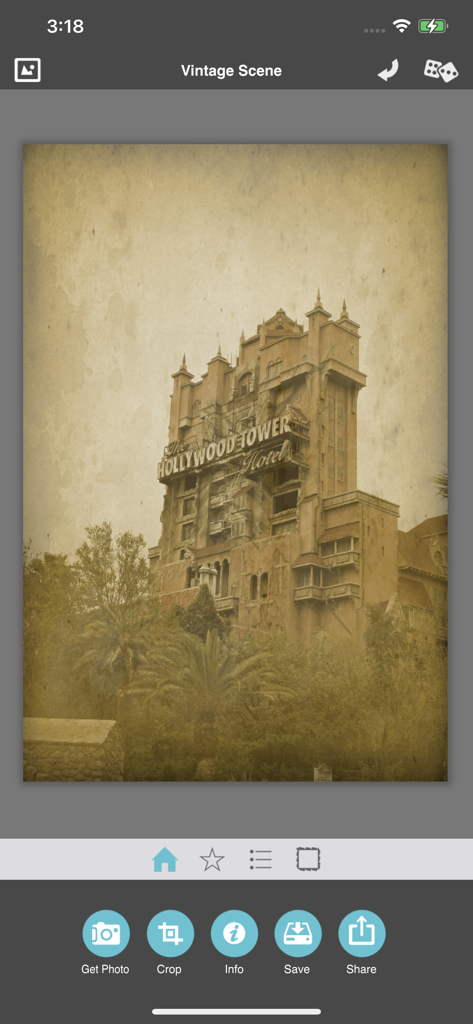 Vintage Scene - Vintage Scene app interface displaying a sepia toned aged photo of a tall building with distressed paper texture