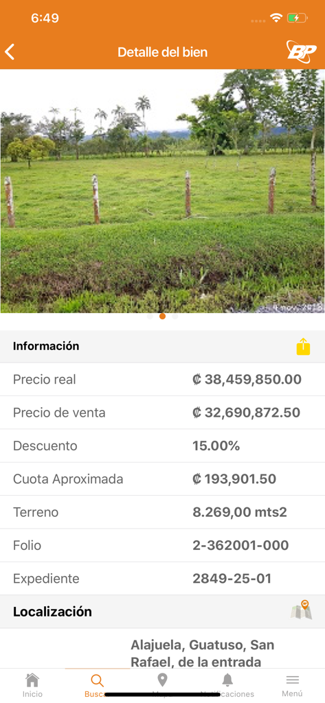 BP Venta de Bienes - Property details screen in the BP Venta de Bienes app showing land pricing and specifications for a listing in Alajuela Costa Rica