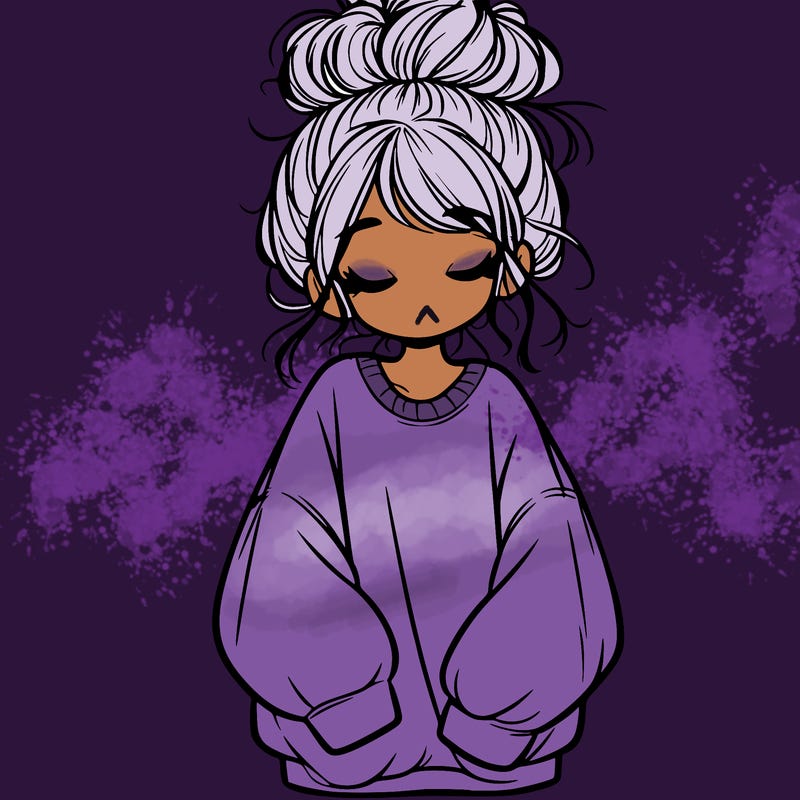 girl with baggy sweatshirt and messy bun