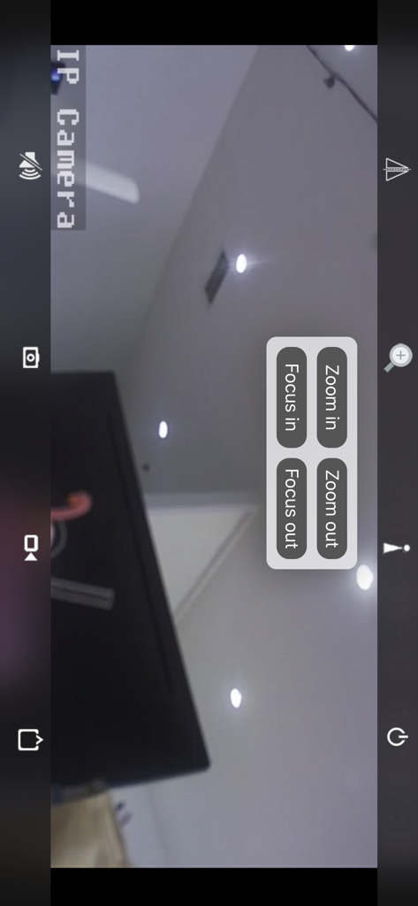 CamHi - CamHi mobile app displaying a live IP camera feed with zoom and focus controls