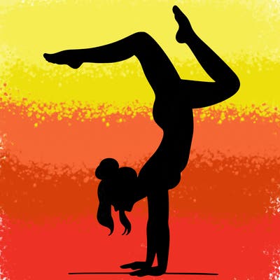 a woman doing a handstand