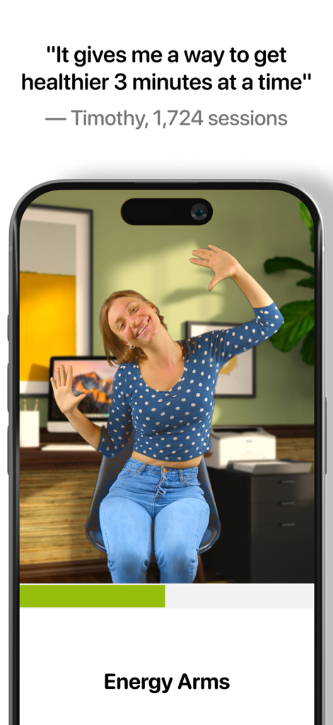A woman performing an Energy Arms exercise while sitting in an office chair using the Wakeout app