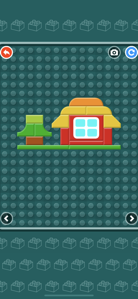 Building Blocks Puzzle Game - A colorful house and tree made of digital building blocks in a preschool puzzle game.