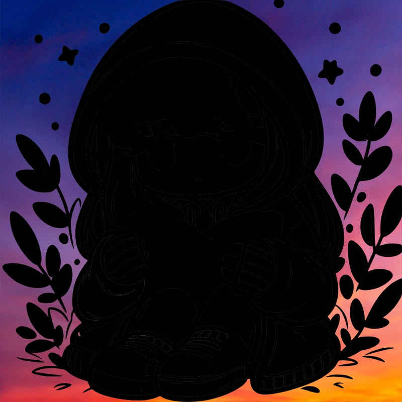 girl in oversized hoodie reading a book