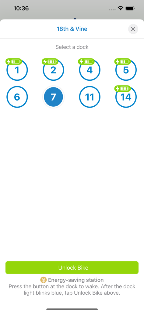 Indego mobile app screen showing a selection of bike docks at the 18th and Vine station with an option to unlock an electric bike.