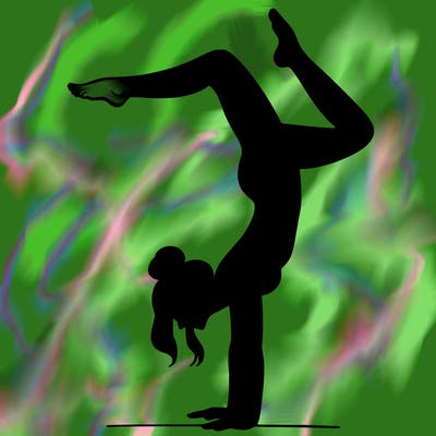 a woman doing a handstand